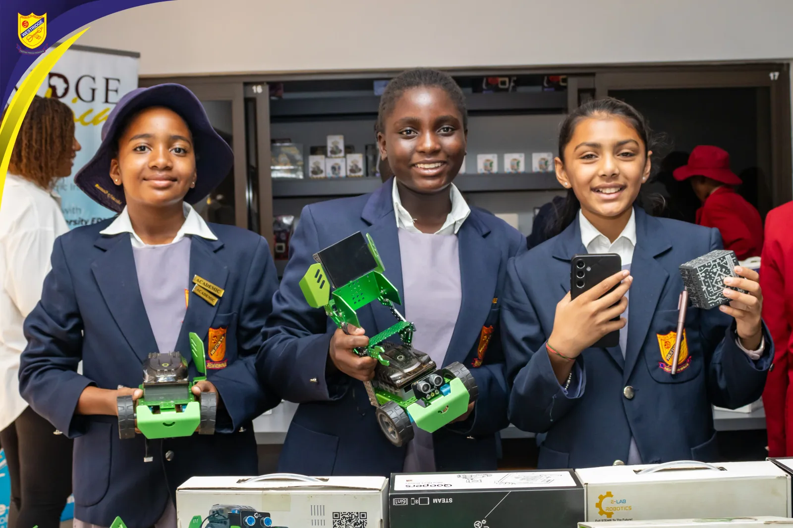 Students showcasing robotics projects at a festival